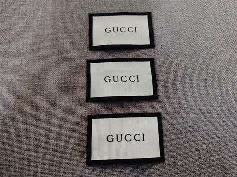 gucci tag material